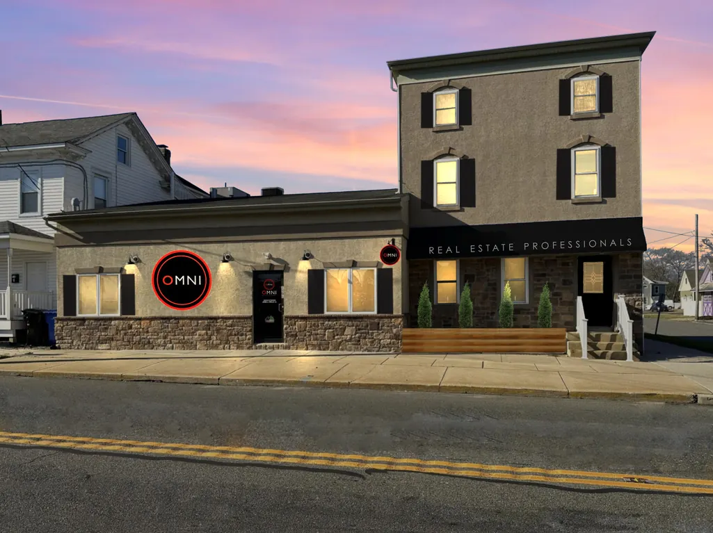 OMNI Real Estate Professionals office on Bridgeton Pike in Mantua, New Jersey at dusk